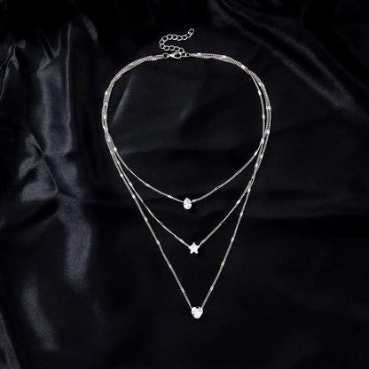 Collier superposé élégant avec pendentifs - Trois chaînes en or