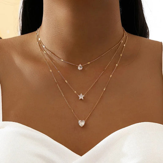 Collier superposé élégant avec pendentifs - Trois chaînes en or